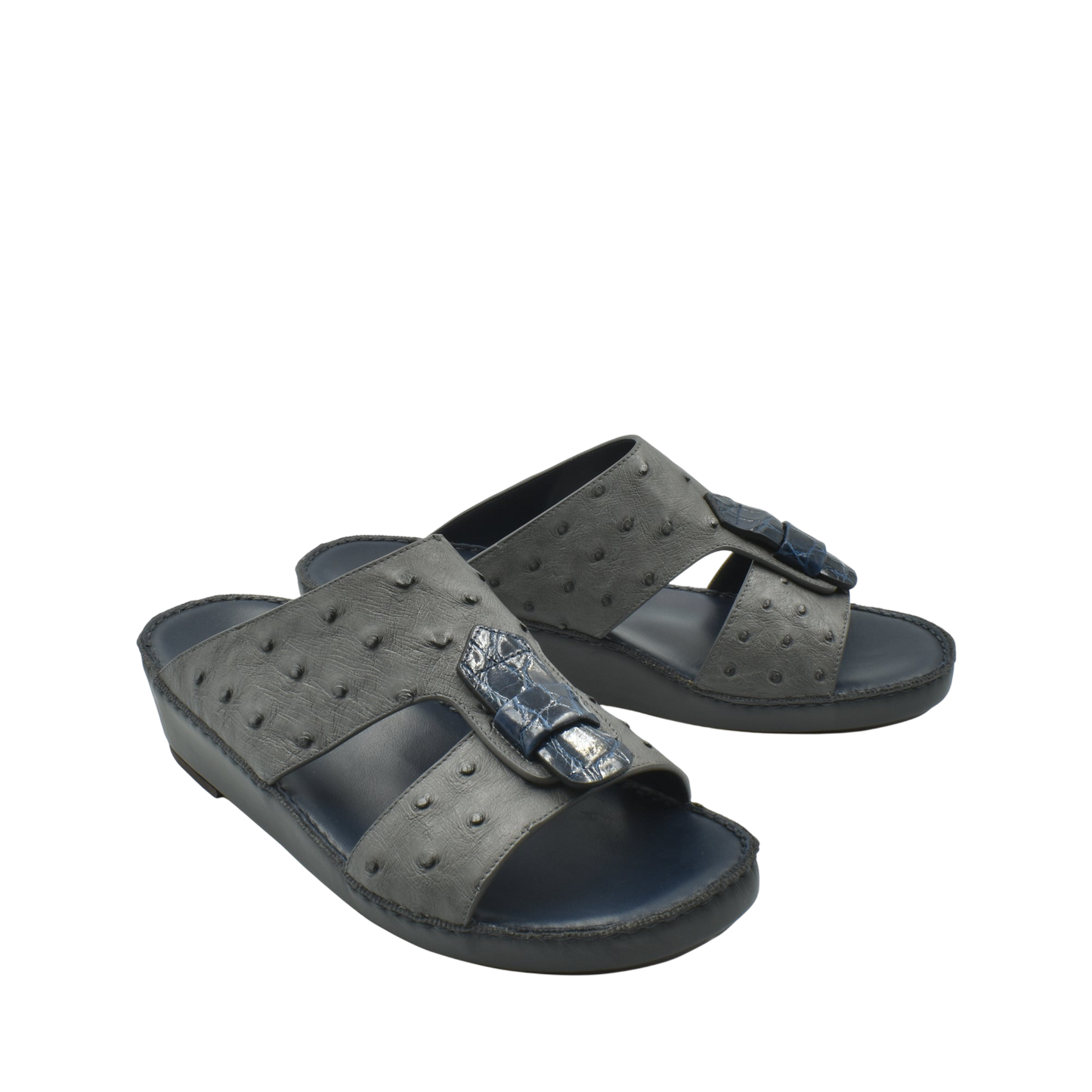 Black ostrich leather sandals with textured pattern and buckle detail from private collection