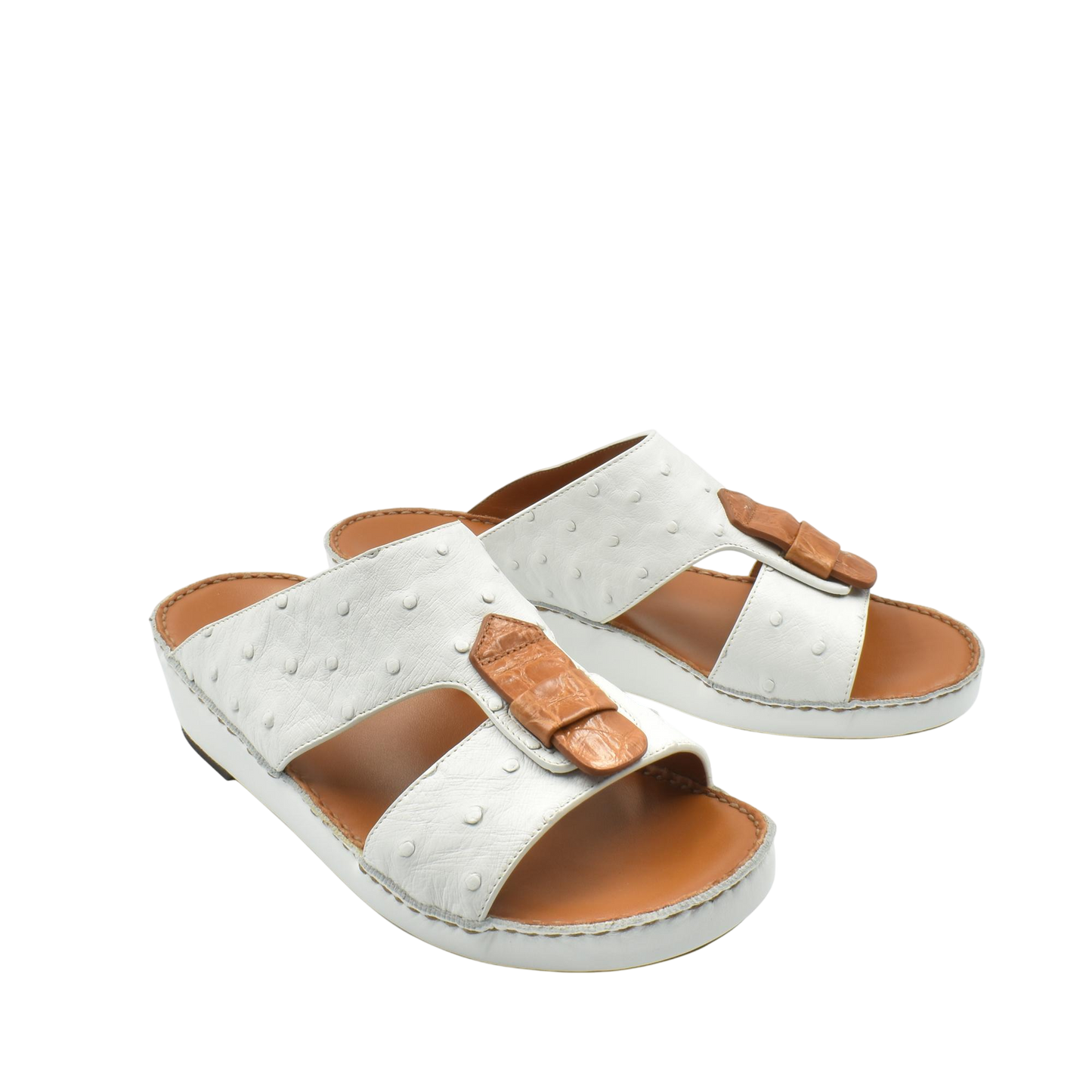 White and brown ostrich leather sandals with adjustable straps and cushioned soles