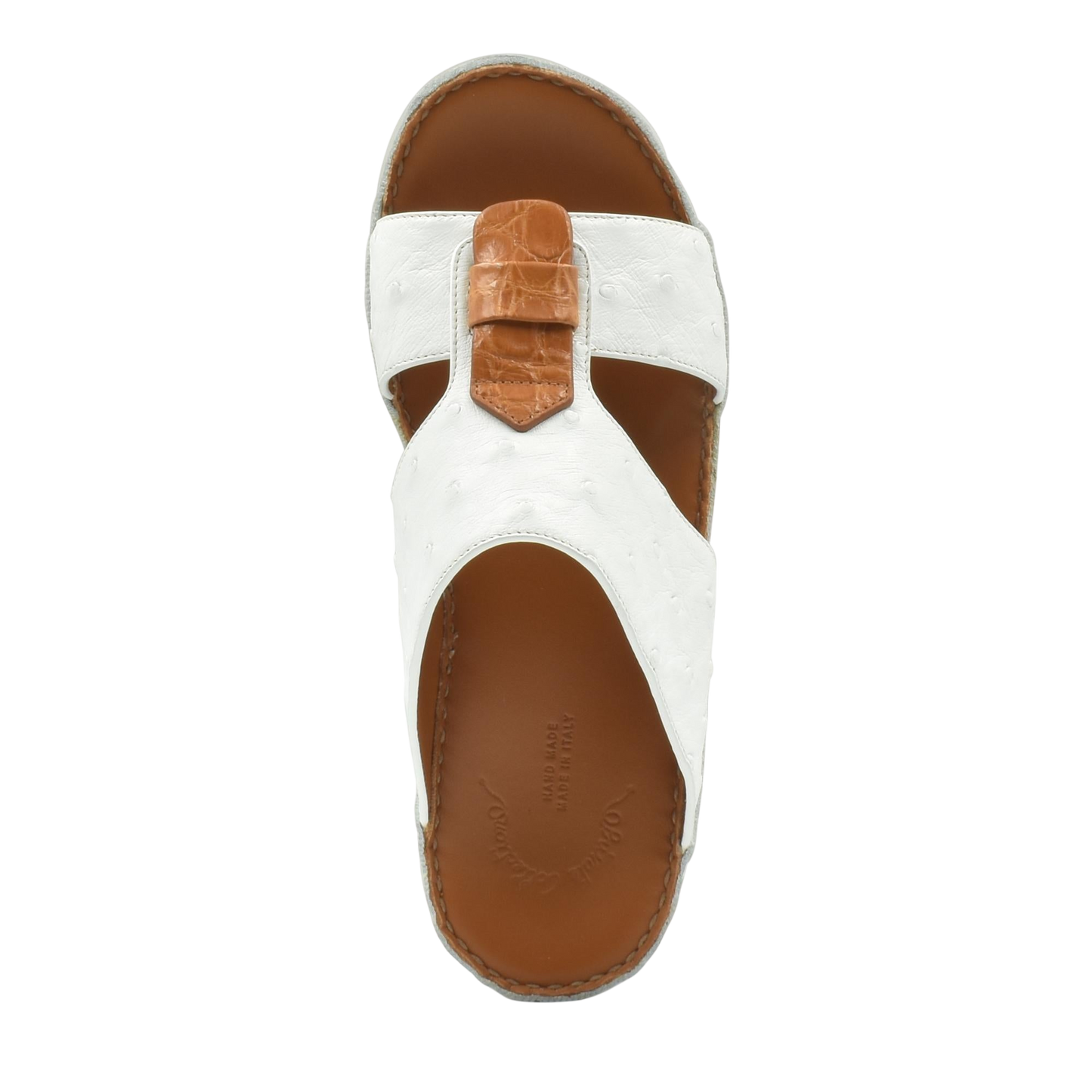 White and brown ostrich leather sandals with adjustable strap and cushioned footbed for comfort