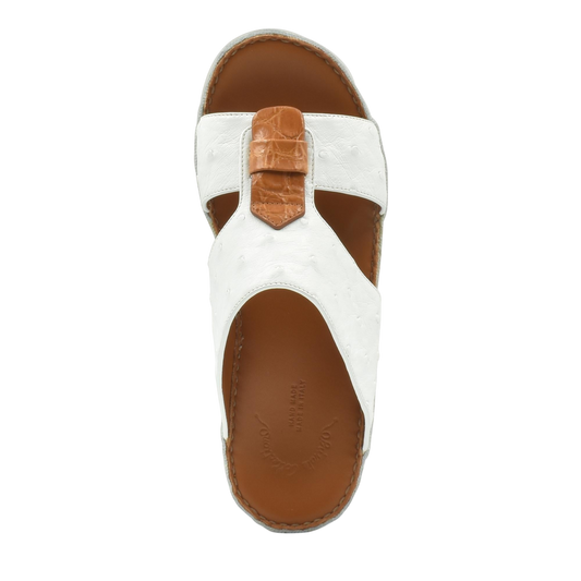White and brown ostrich leather sandals with adjustable strap and cushioned footbed for comfort