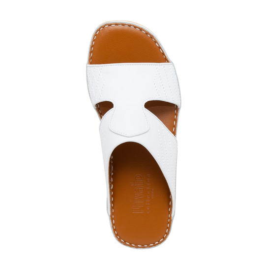 Top view of white western sandals leather with brown insole and detailed stitching