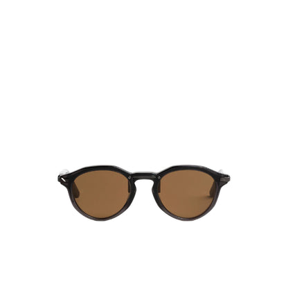 Sunglasses with brown lenses and black frame on a white background