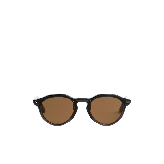 Sunglasses with brown lenses and black frame on a white background