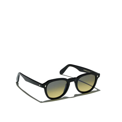 Black round frame sunglasses with gradient lenses from Private Collection on white background