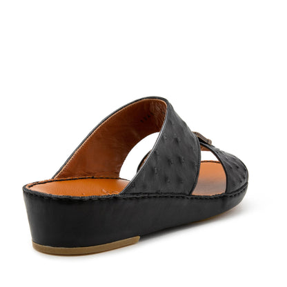 Black luxury leather sandals with textured upper and cushioned tan insole from private collection