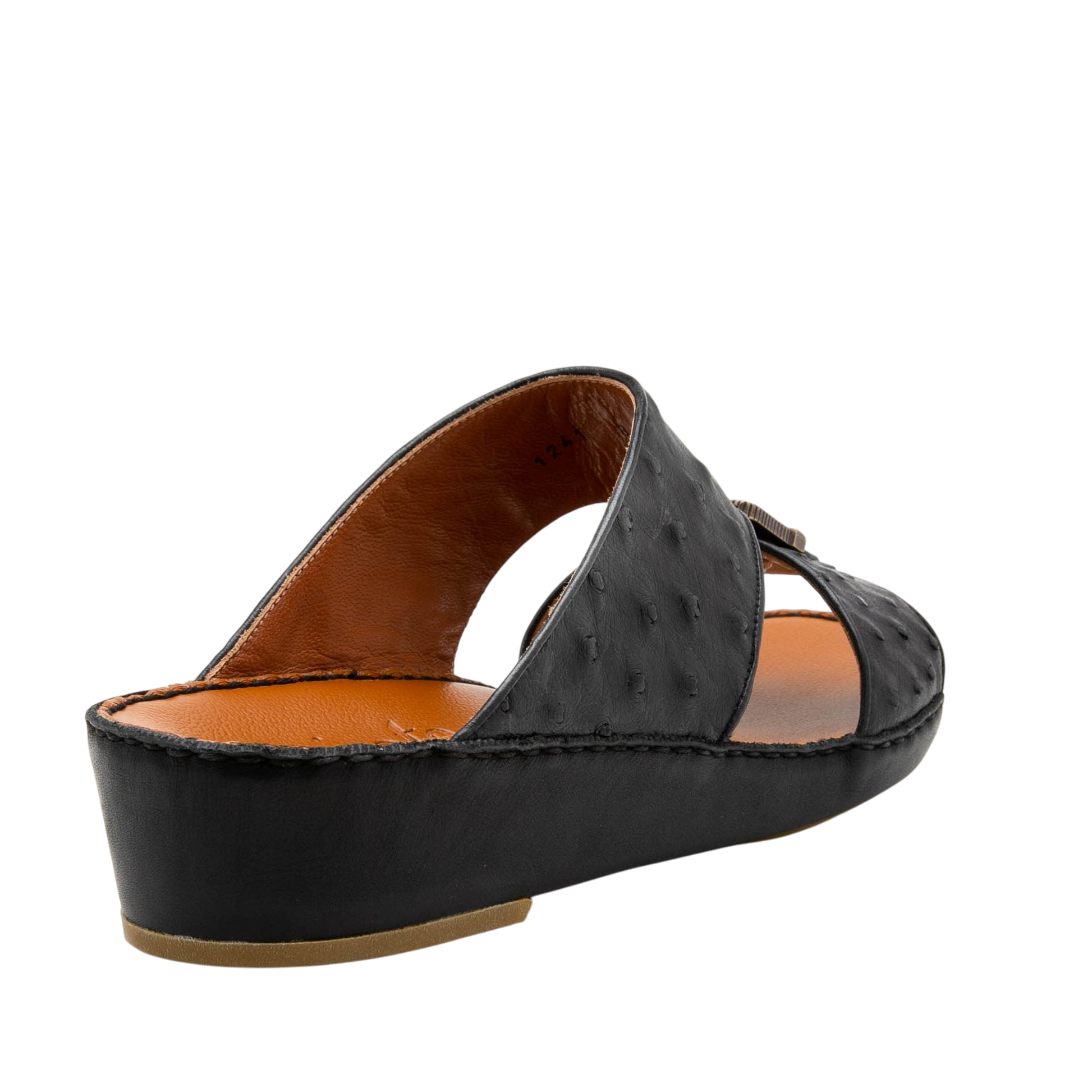 Black luxury leather sandals with textured upper and cushioned tan insole from private collection