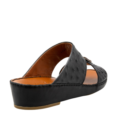 Black luxury leather sandals with textured upper and cushioned tan insole from private collection