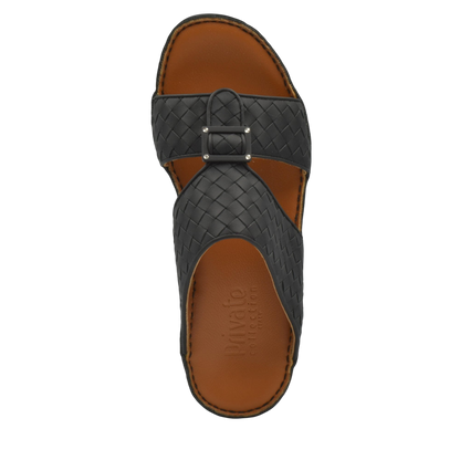 Top view of black casual rubber calf sandals with woven straps and brown sole from Private collection