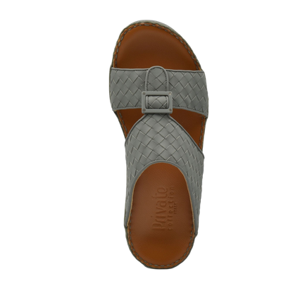 Gray woven leather casual rubber calf sandals with adjustable buckle strap and brown footbed