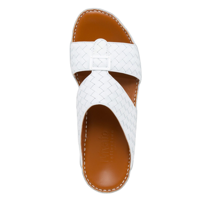 White casual rubber calf sandals with woven straps and brown cushioned footbed for comfortable wear