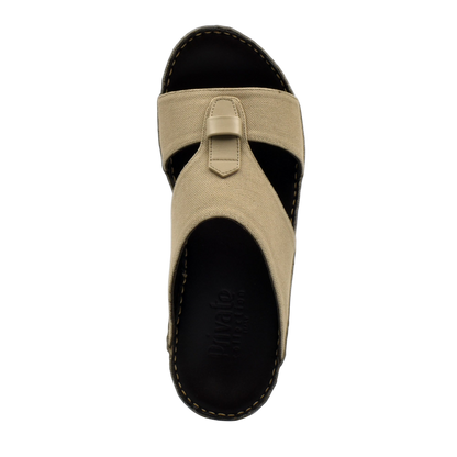 Beige casual wedge sandals with black sole and stitched detailing from Private Collection