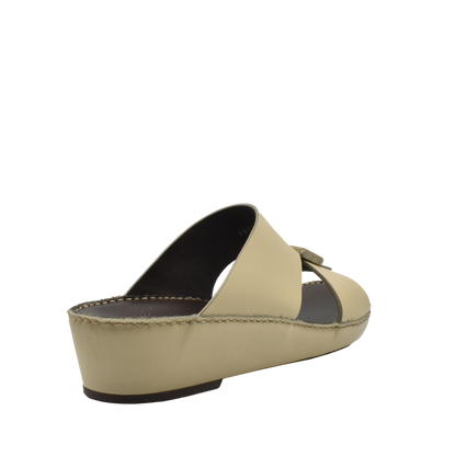 Beige Cerchio buckle sandals with low wedge heel and open toe from Private collection