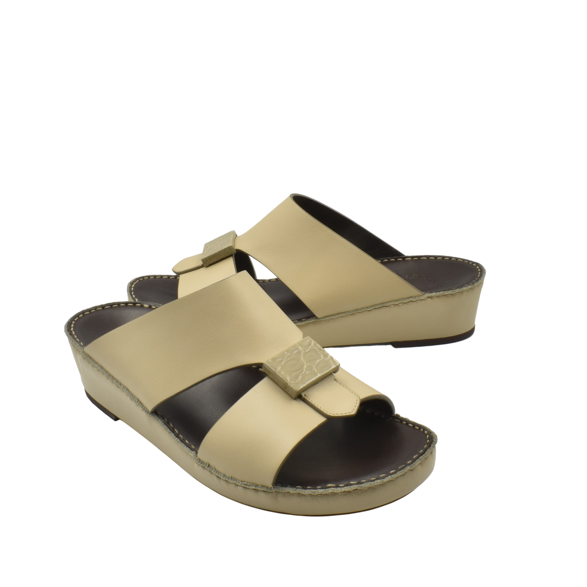 Beige Cerchio buckle sandals with cushioned black footbed and adjustable straps for comfort
