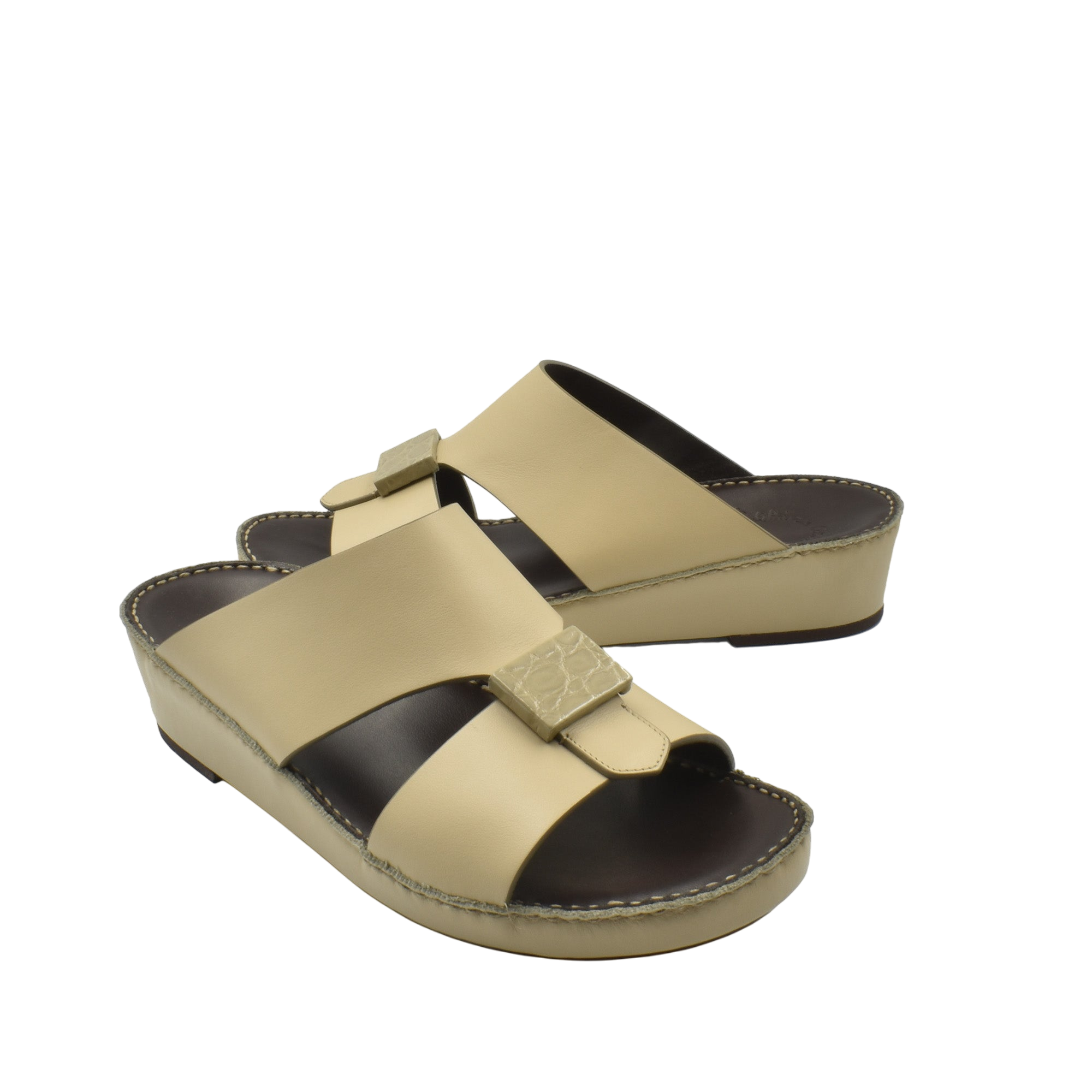 Beige Cerchio buckle sandals with cushioned black footbed and adjustable straps for comfort