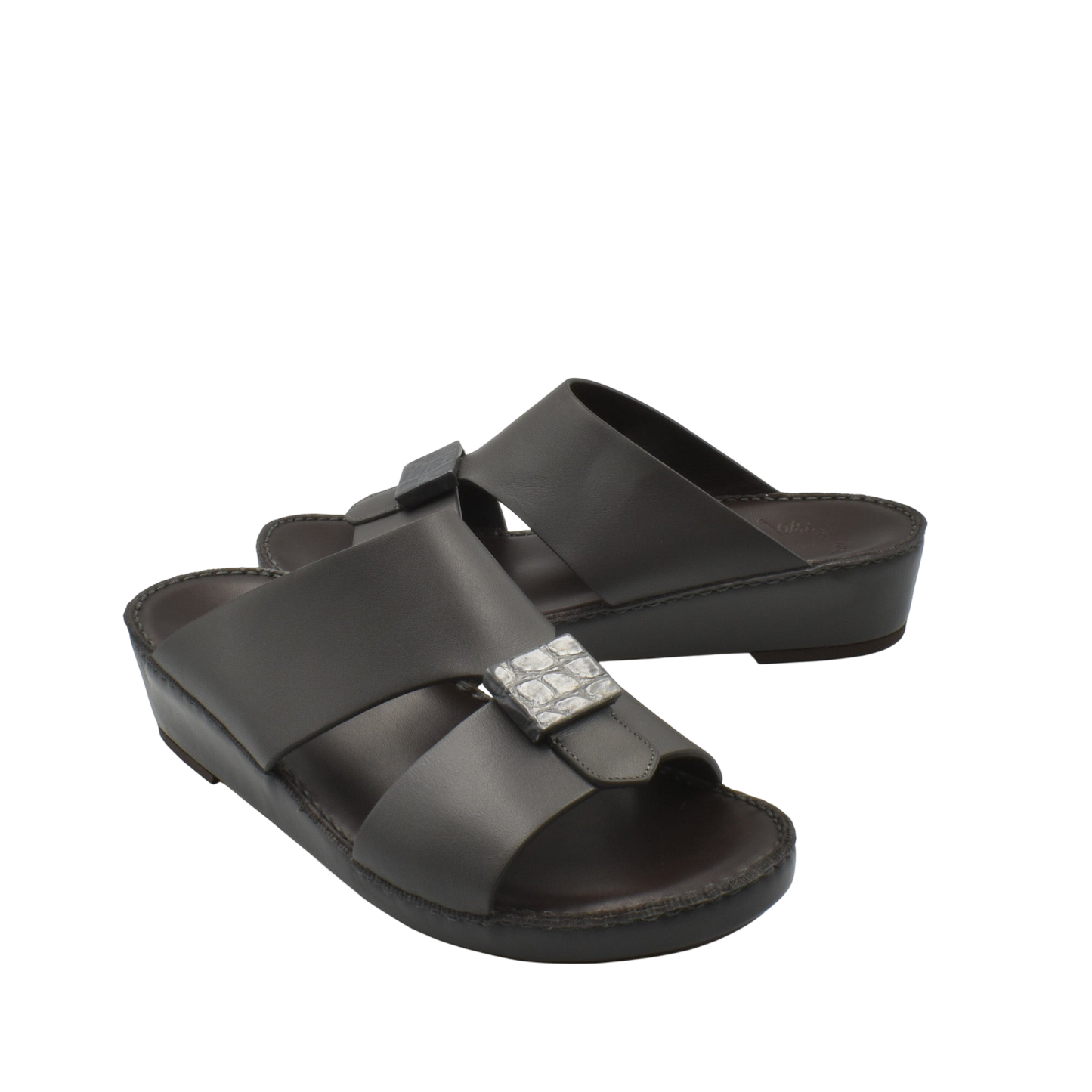 Black leather Cerchio buckle sandals with silver buckle and cushioned footbed for comfort