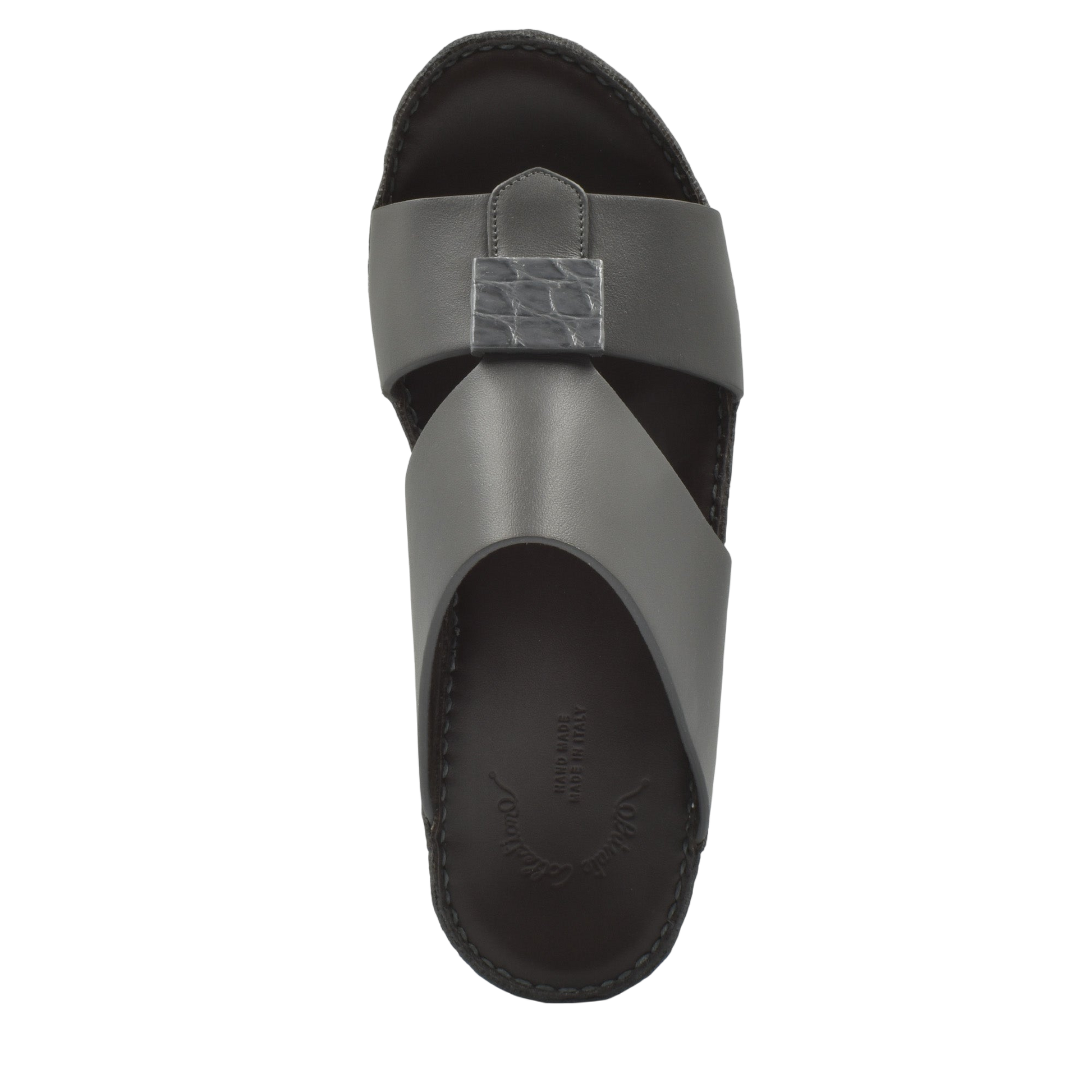 Top view of gray Cerchio buckle sandals with crisscross leather straps and textured buckle detail