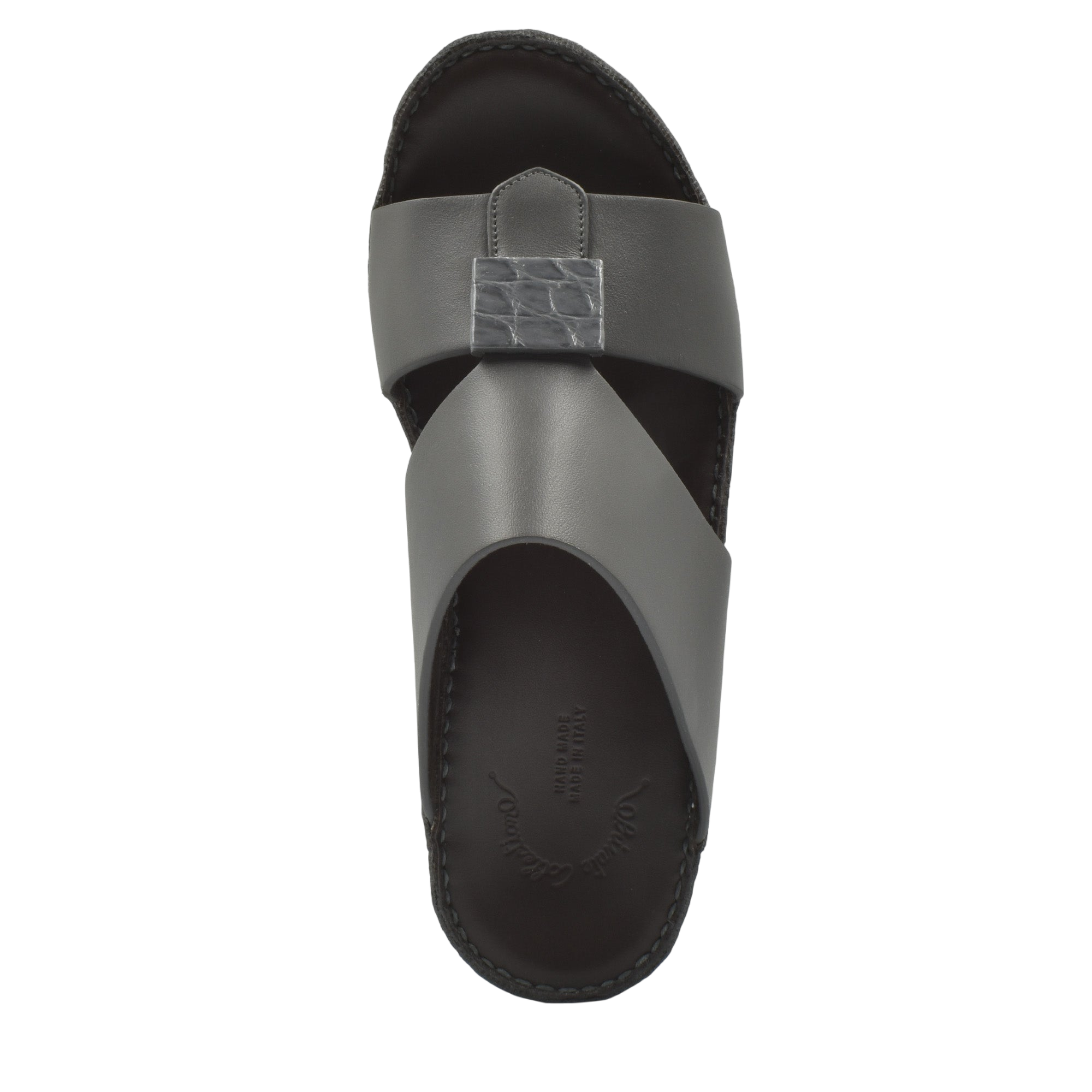 Top view of gray Cerchio buckle sandals with crisscross leather straps and textured buckle detail