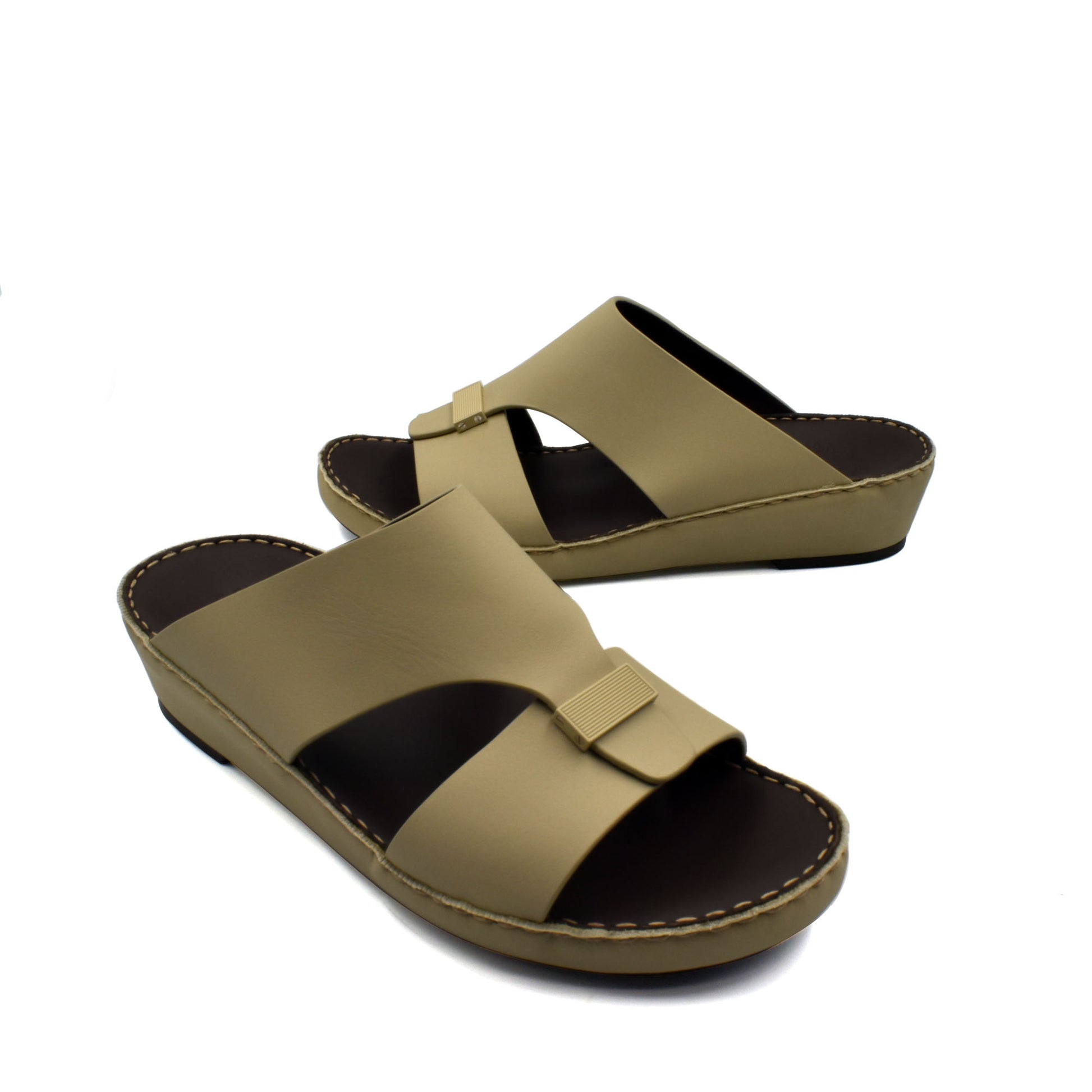Beige Cerchio Gomato sandals with cross straps and cushioned sole from Private collection