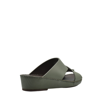 Olive green luxury leather sandals with crisscross straps and low wedge heel by Private Collection