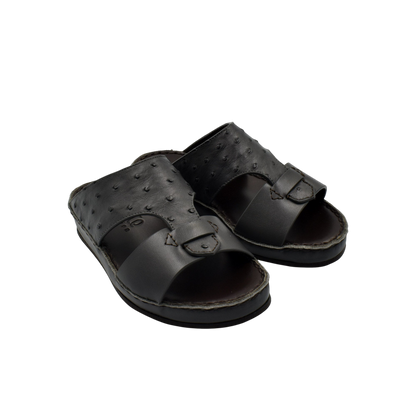 Comfortable kids sandals in dark brown leather with adjustable straps and cushioned sole