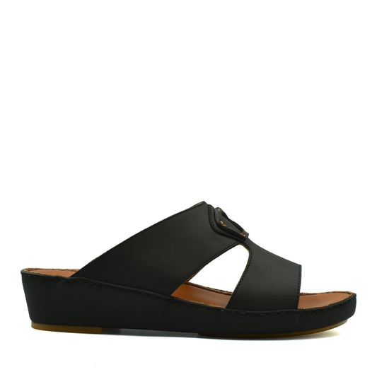 Black comfortable leather slip-on sandals with cushioned sole and open sides from Private Collection