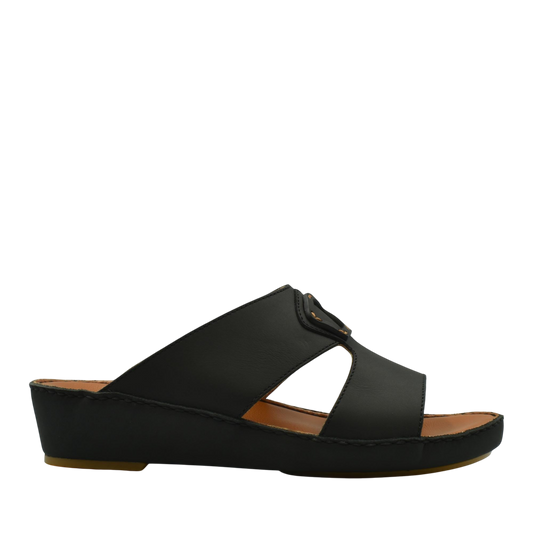 Black comfortable leather slip-on sandals with cushioned sole and open sides from Private Collection