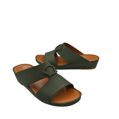 Comfortable leather slip-on sandals in dark green with adjustable buckle and cushioned footbed