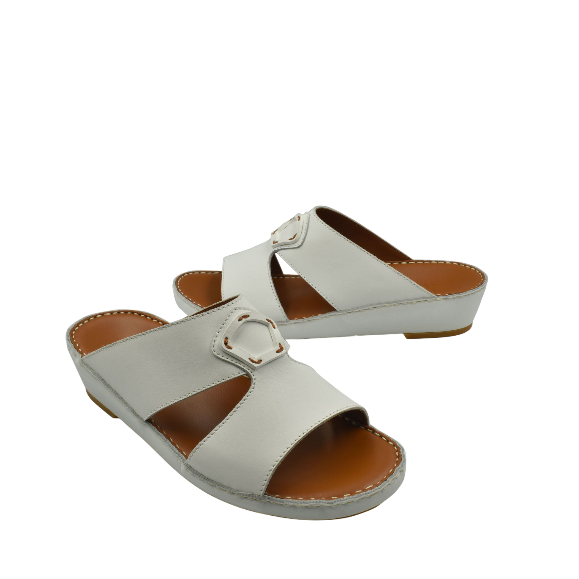 Comfortable leather slip-on sandals in white with a cushioned sole and adjustable buckle strap