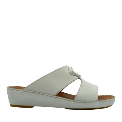 White comfortable leather slip-on sandals with open toe and cushioned sole for casual wear
