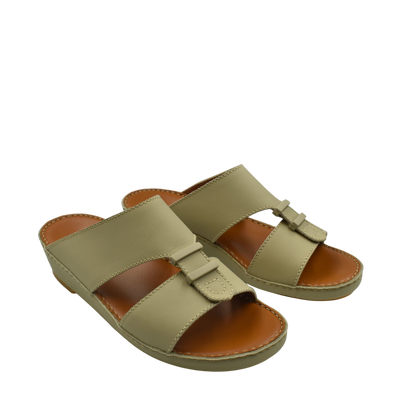 Comfortable rubber sandals in olive green with cushioned brown footbed and adjustable straps