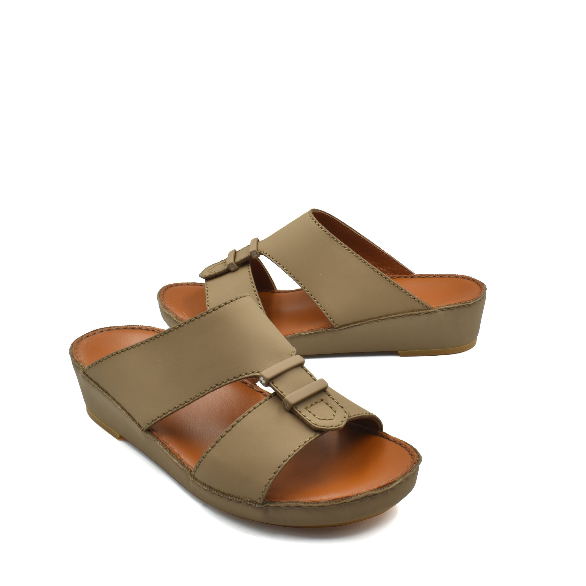 Pair of beige comfortable rubber sandals with adjustable straps and cushioned soles