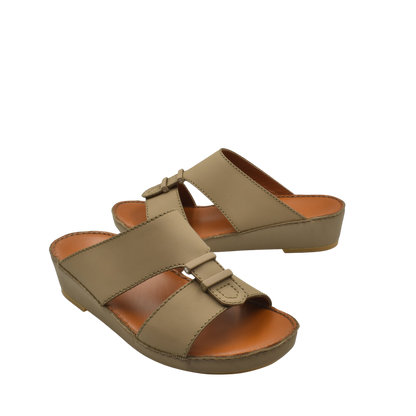 Pair of beige comfortable rubber sandals with adjustable straps and cushioned soles