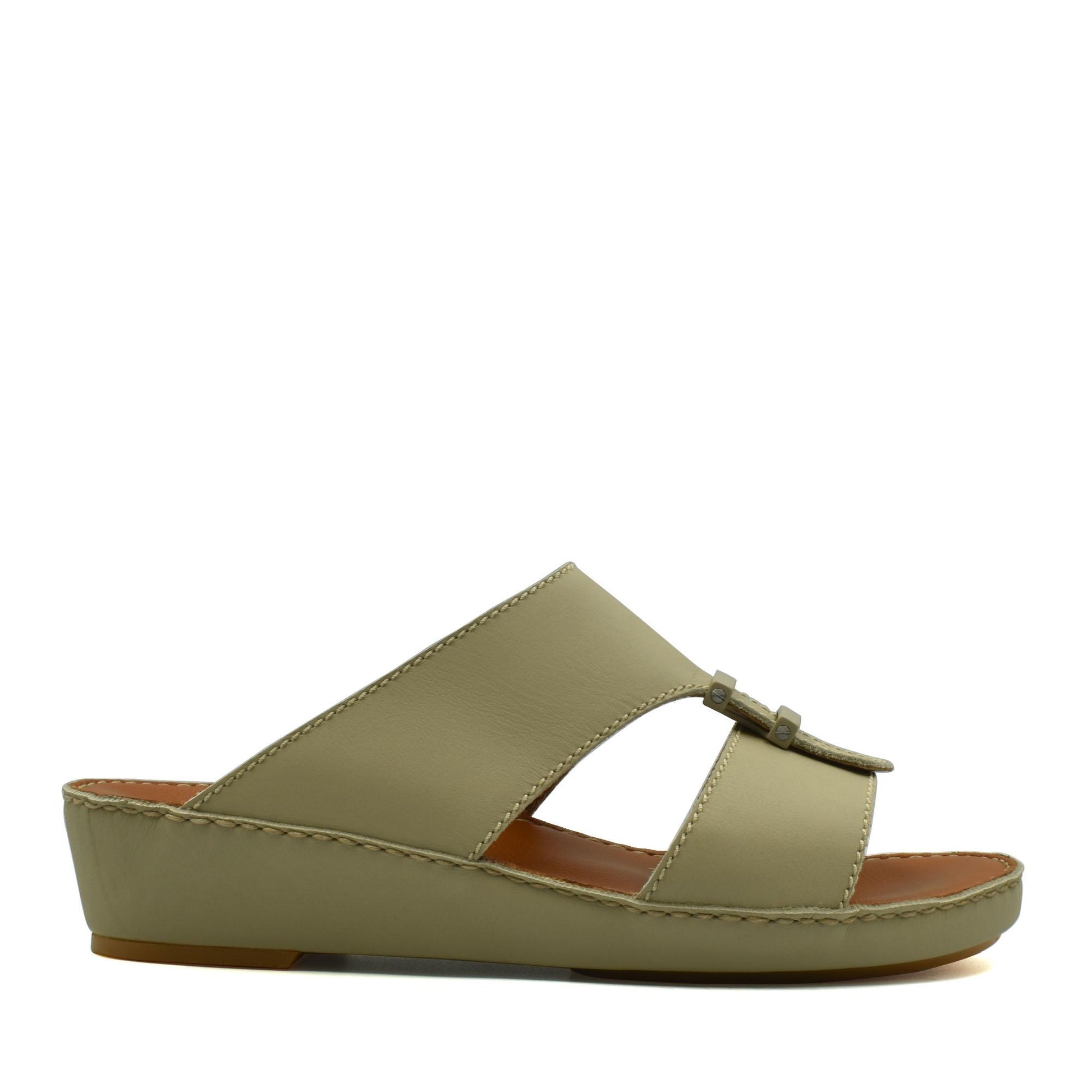 Side view of comfortable rubber sandals in olive green with slip-on design and cushioned sole