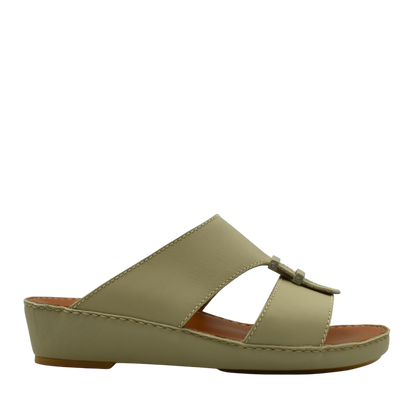 Side view of comfortable rubber sandals in olive green with slip-on design and cushioned sole
