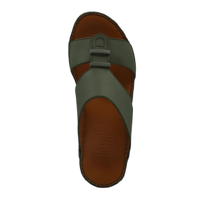 Top view of comfortable rubber sandals with green straps and brown footbed from private collection
