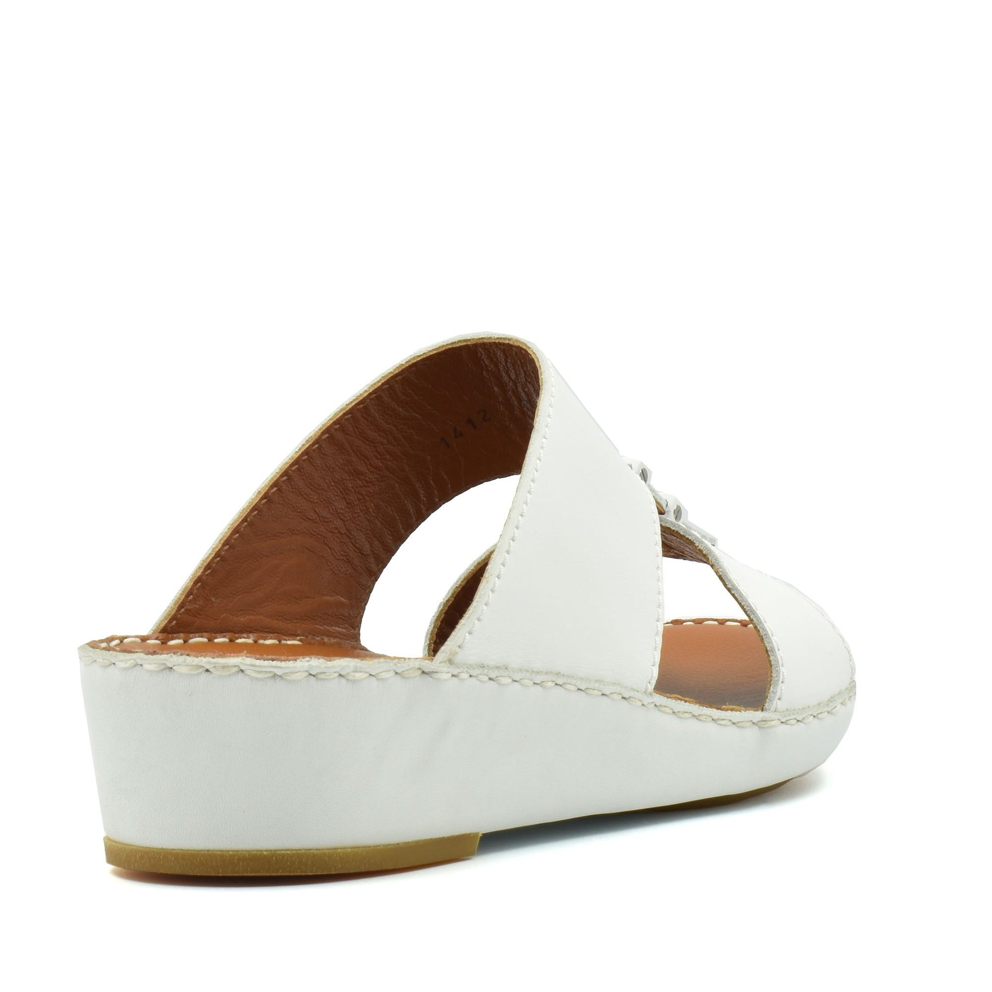 White comfortable rubber sandals with cushioned sole and open back design for casual wear