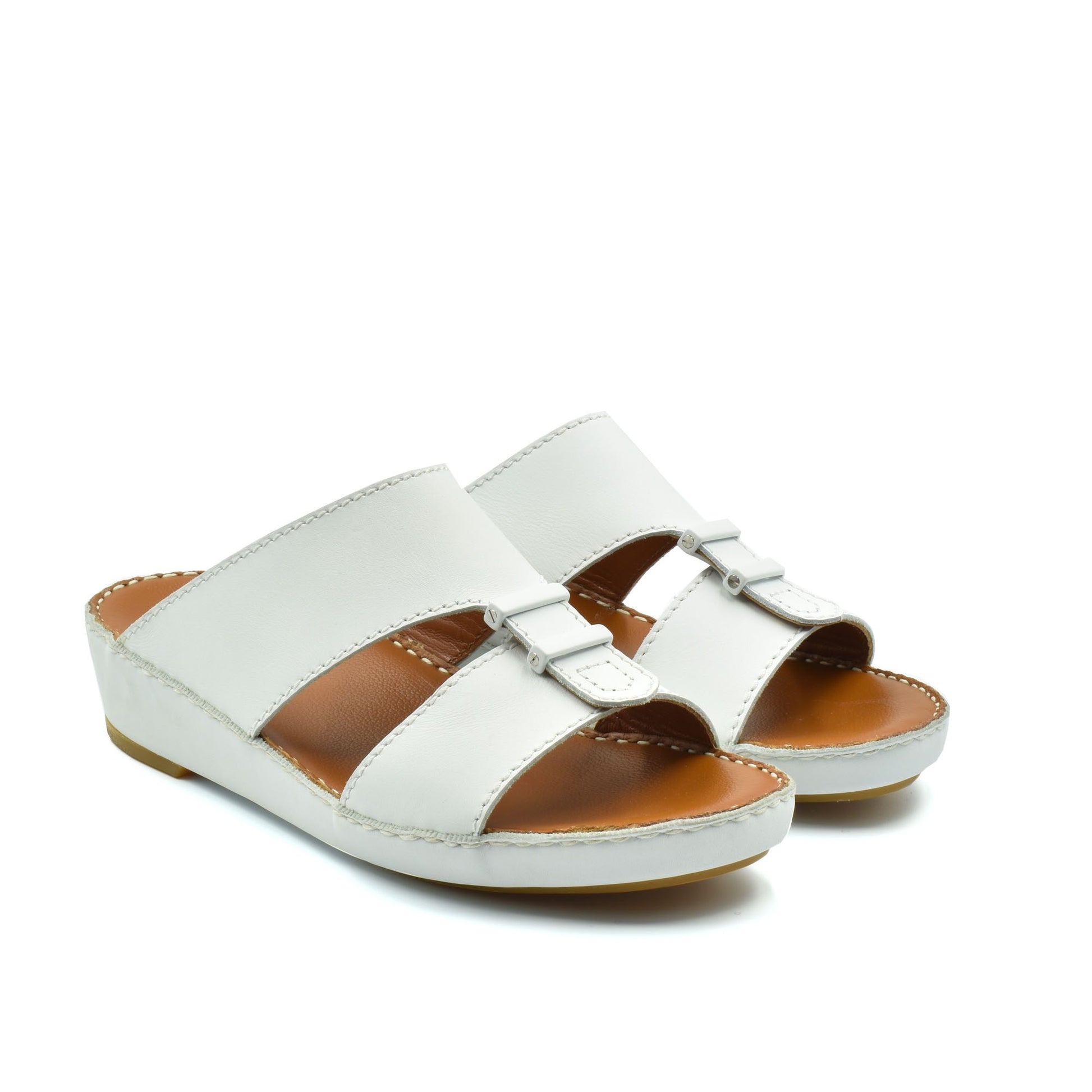 White comfortable rubber sandals with adjustable straps and cushioned brown footbed for casual wear