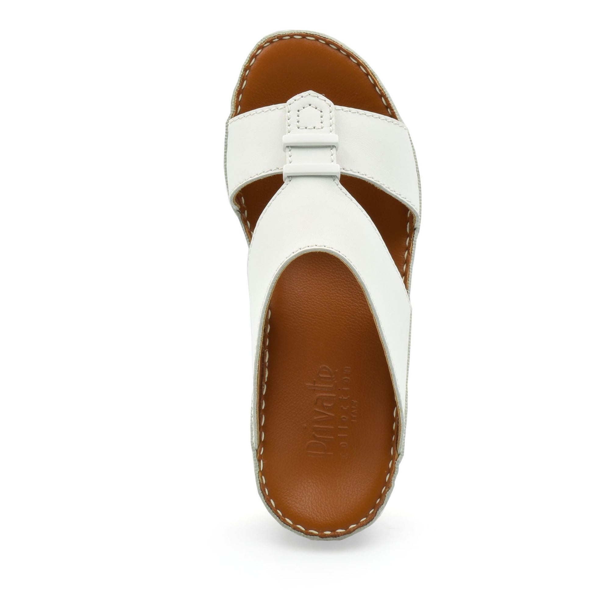 White comfortable rubber sandals with brown cushioned footbed and stitched edges