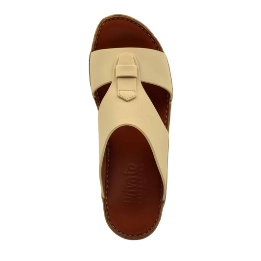 Beige comfortable rubber slides with brown cushioned footbed and stitched sole from Private Collection