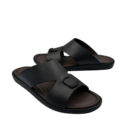 Comfortable stylish slides in black with textured leather straps and cushioned footbed from Private collection