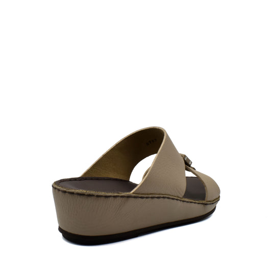 Beige deercalf leather sandals with wedge sole and adjustable buckle strap from Private collection
