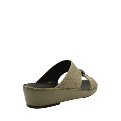 Beige quilted deercalf leather sandals with low wedge heel and open toe design