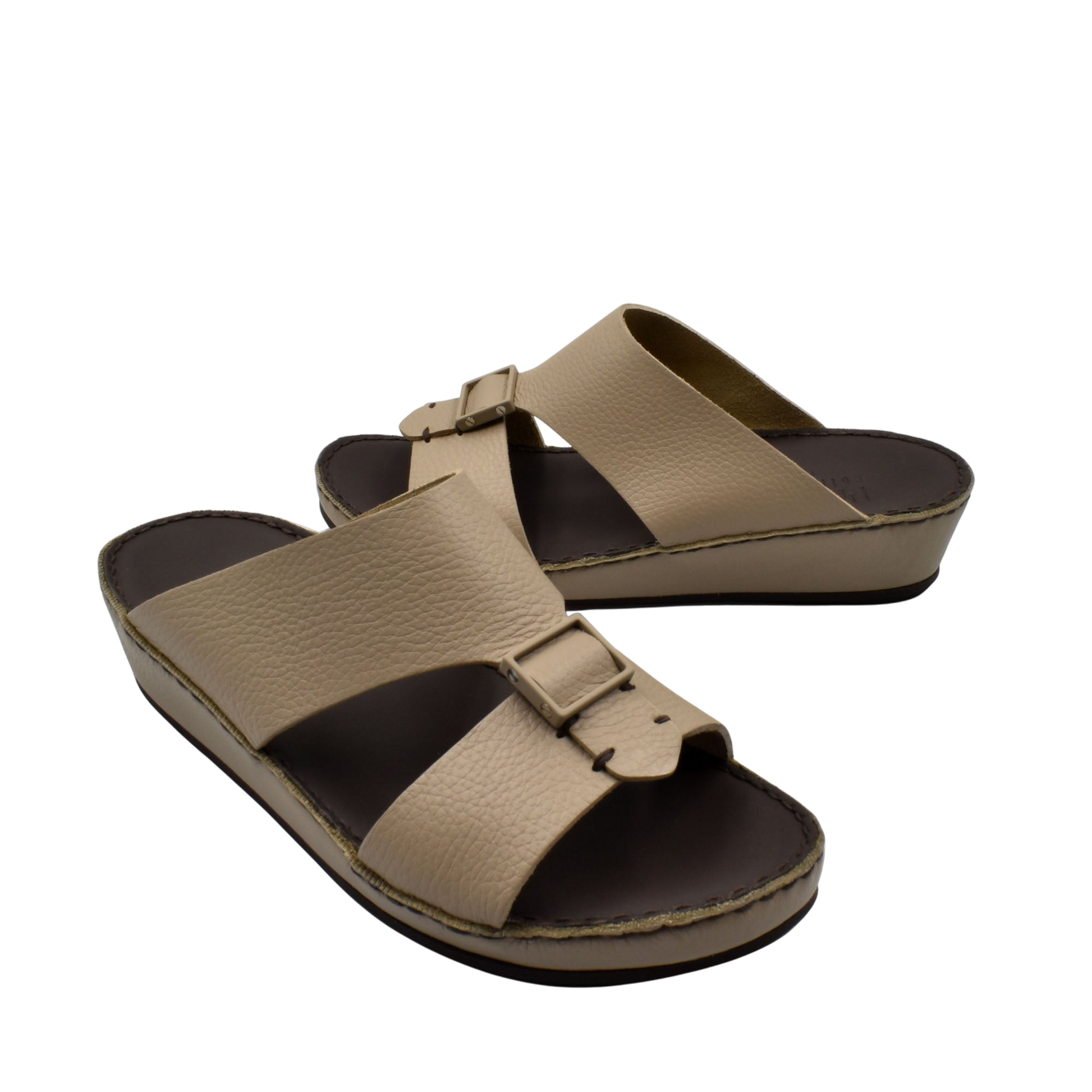 Beige deercalf leather sandals with adjustable buckle straps and cushioned footbed for comfort