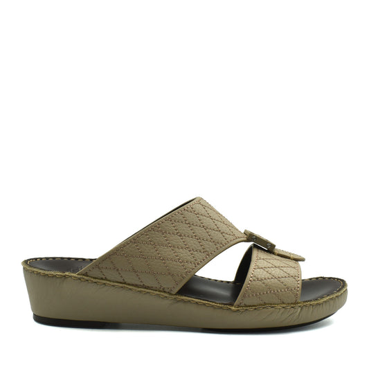 Tan deercalf leather sandals with quilted straps and cushioned sole in a slide-on style