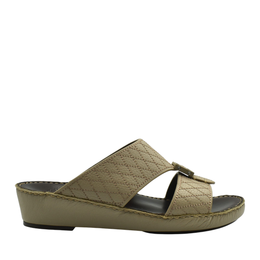 Tan deercalf leather sandals with quilted straps and cushioned sole in a slide-on style