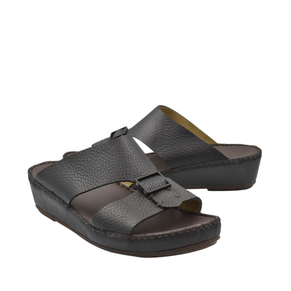 Black deercalf leather sandals with adjustable straps and cushioned wedge sole from private collection