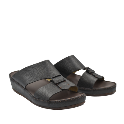Black deercalf leather sandals with adjustable straps and cushioned sole for comfort