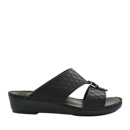 Black deercalf leather sandals with quilted straps and cushioned wedge sole for comfortable wear