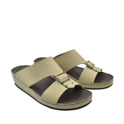 Beige deercalf leather sandals with adjustable buckles and cushioned brown footbed
