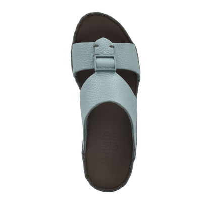 Light blue deercalf leather sandals with buckle strap and cushioned brown sole from Private Collection
